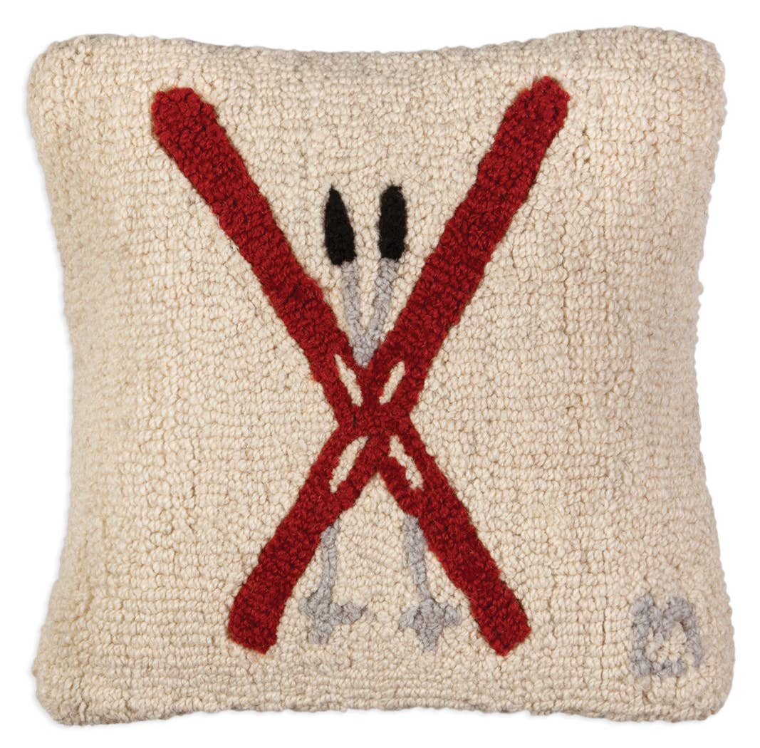 A square beige textured throw pillow featuring a red crossed-sabers graphic with black and gray details, set against a plain white background.