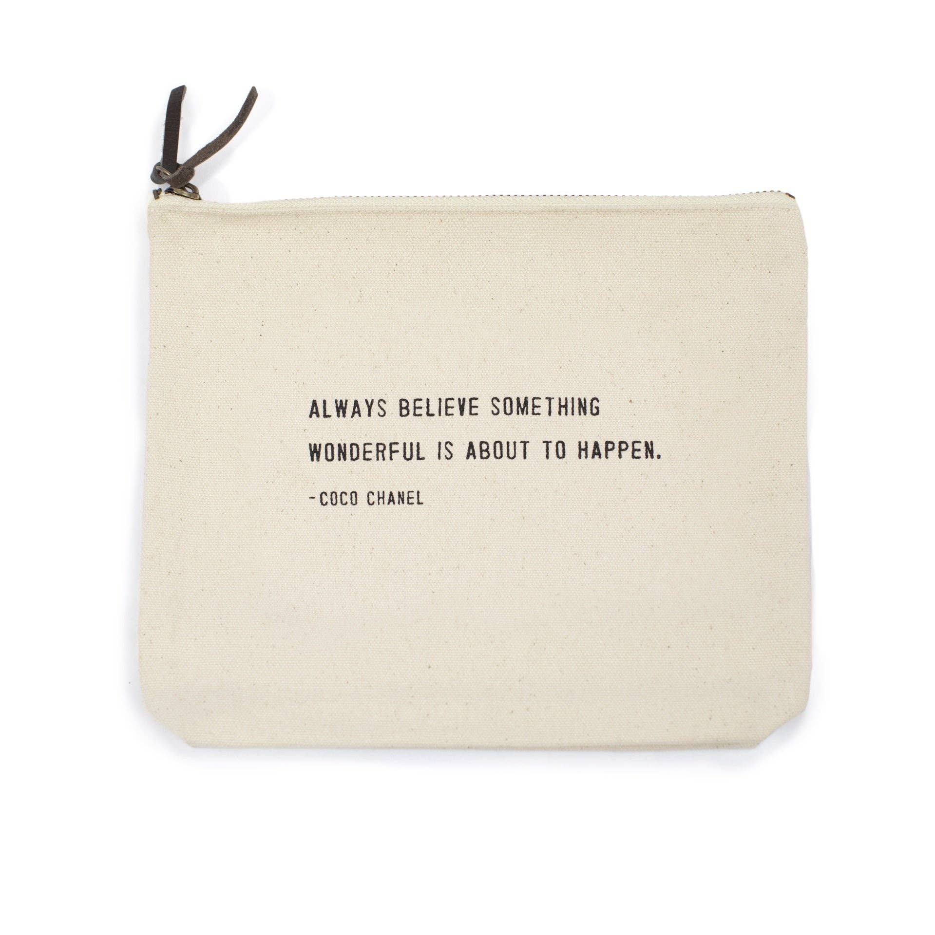 Beige pouch with black text quote on a white background