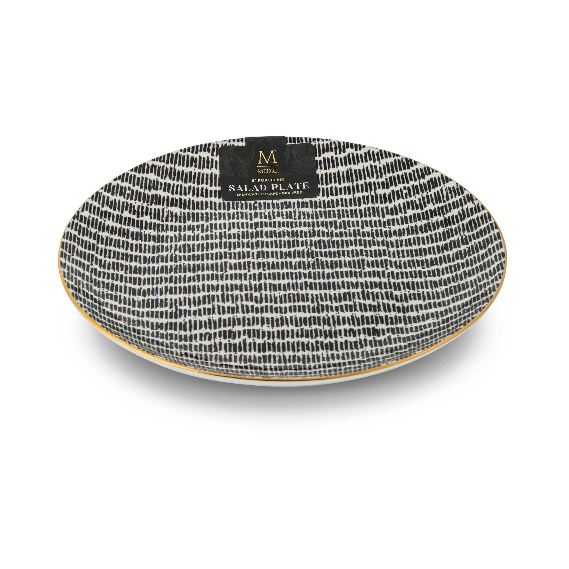 An oval ceramic salad plate with a black and white textured brushstroke pattern and a gold rim, featuring a black brand label on top.