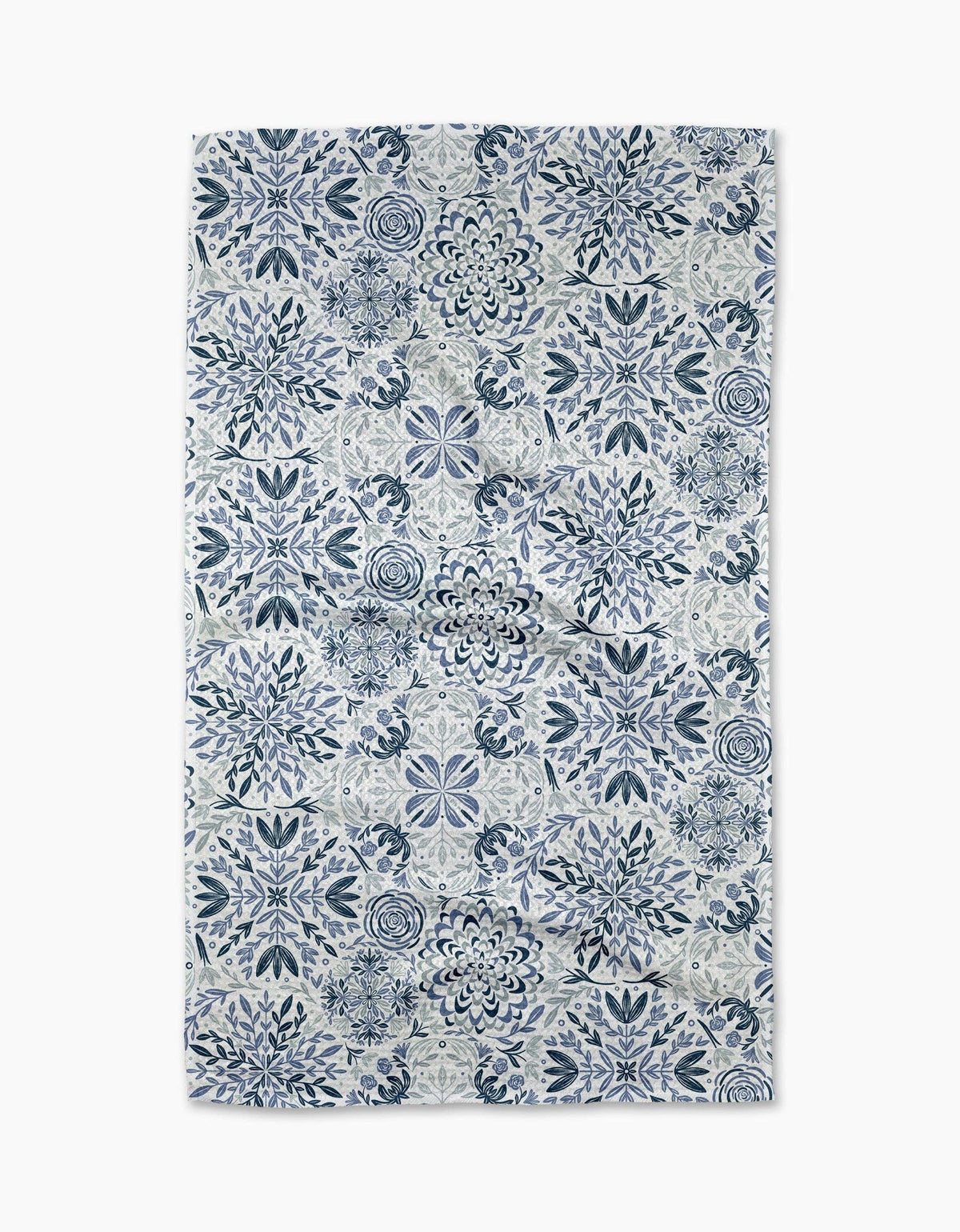 A rectangular textile item, likely a towel or blanket, featuring a detailed blue and white Mediterranean tile pattern, displayed flat against a light gray background.