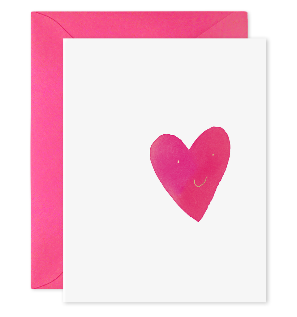 Greeting card with pink heart design on a white background, accompanied by a pink envelope.
