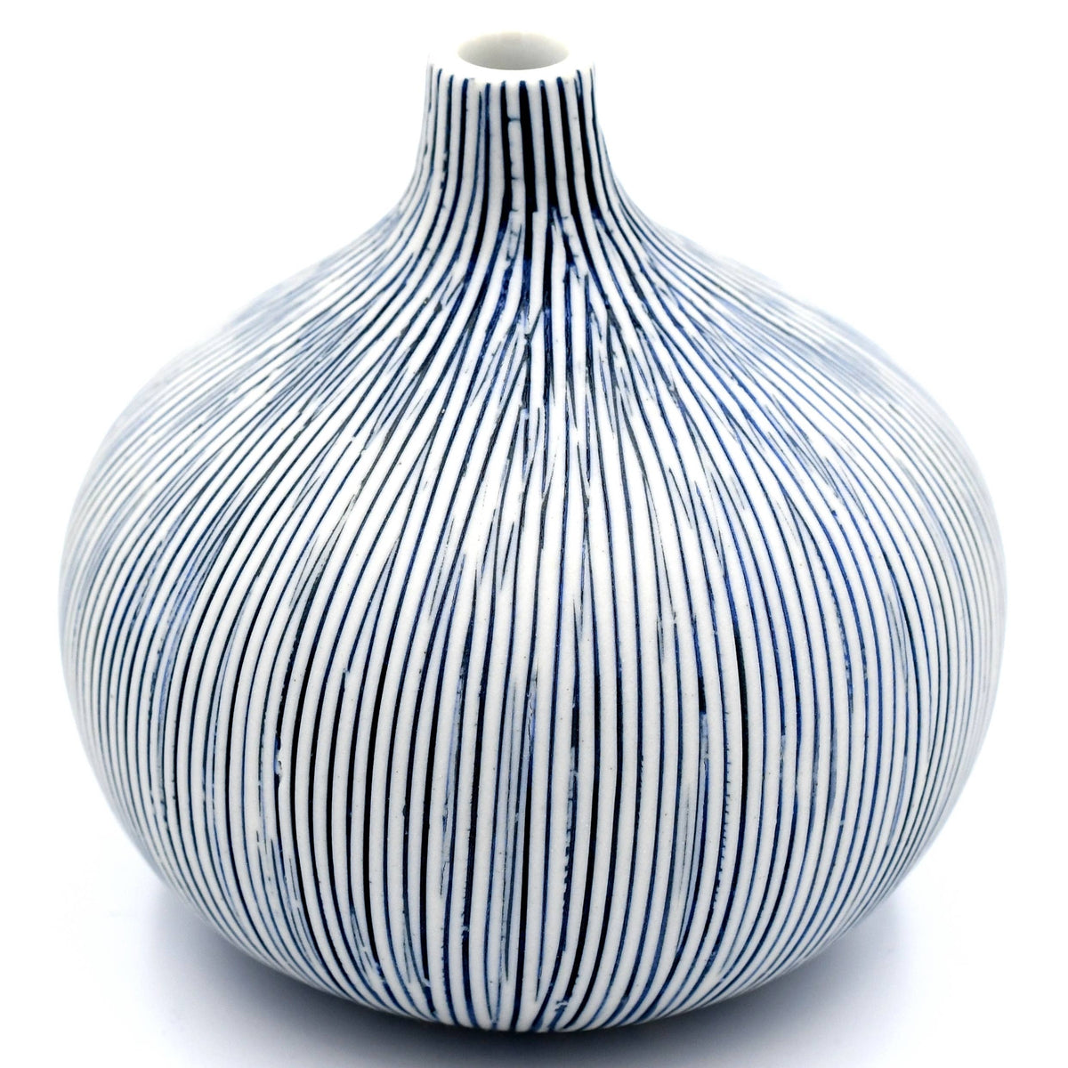 A white ceramic vase with a bulbous, rounded body and a narrow neck, decorated with a pattern of vertical blue and black wavy stripes, set against a plain white background.