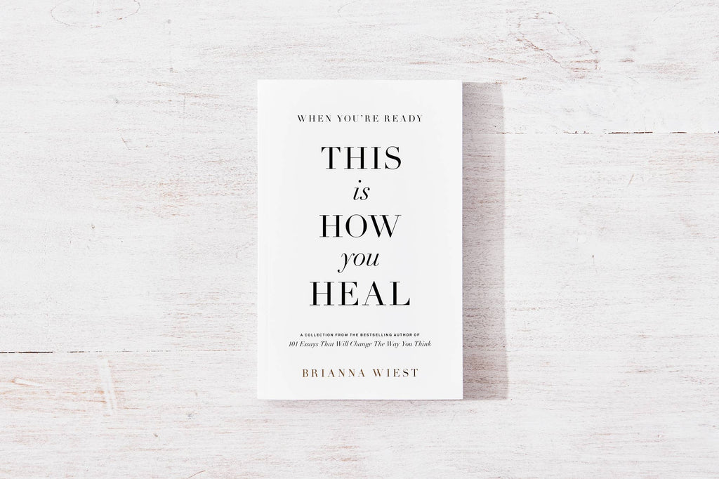 Book cover of 'This is How You Heal' by Brianna Wiest on a textured white background
