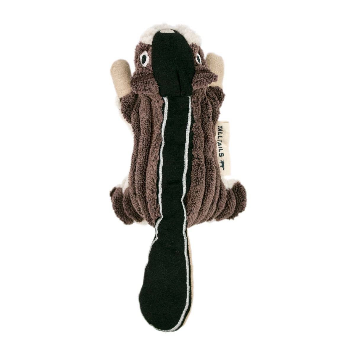 Dog toy resembling a skunk on a white background