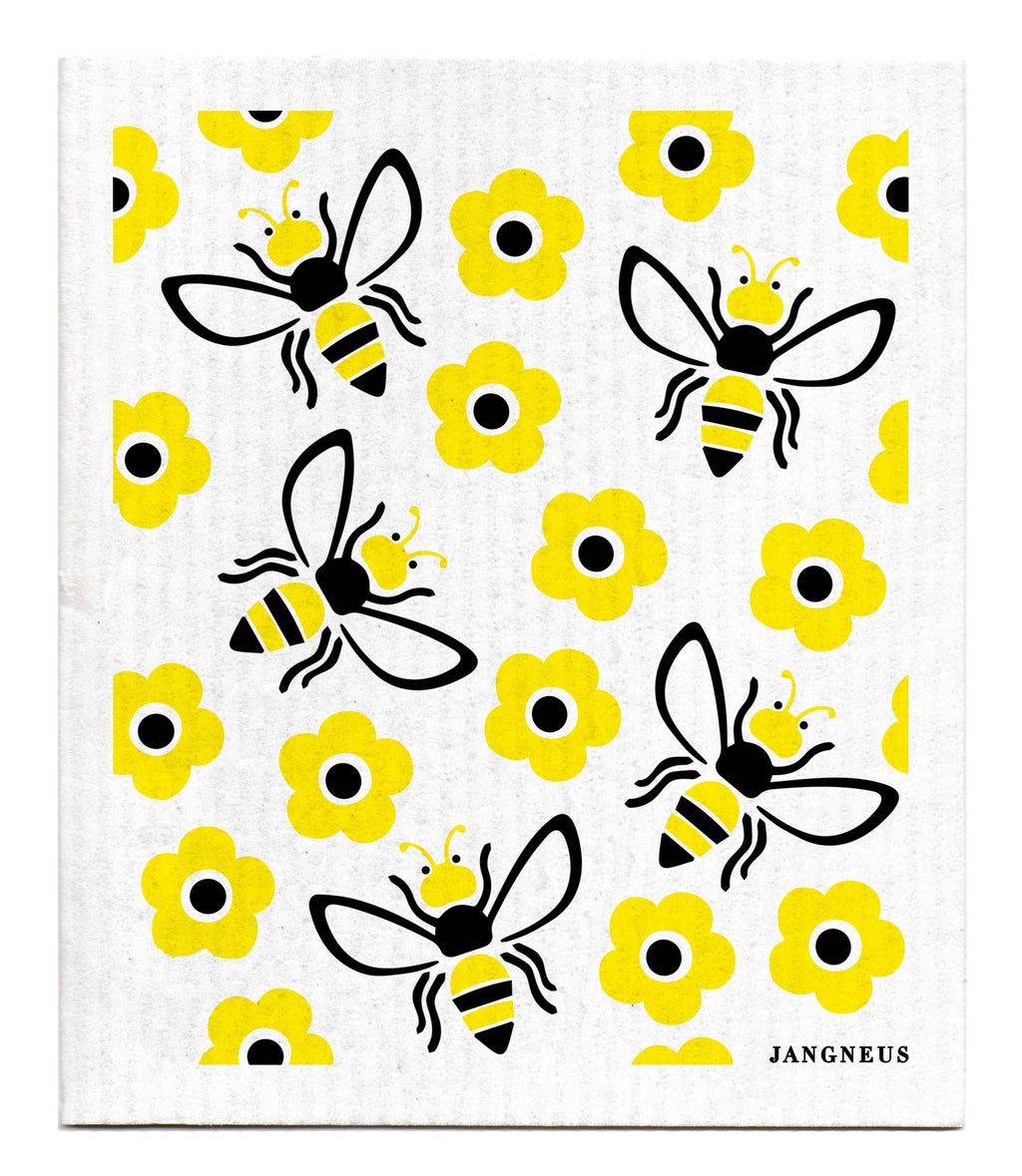 White cloth with black bees and yellow flowers pattern, brand 'Jangneus' visible