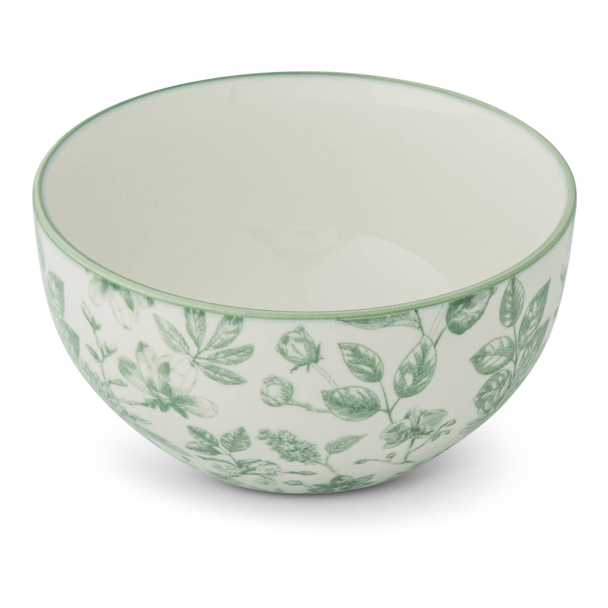 Ceramic bowl with green leaf pattern on a white background