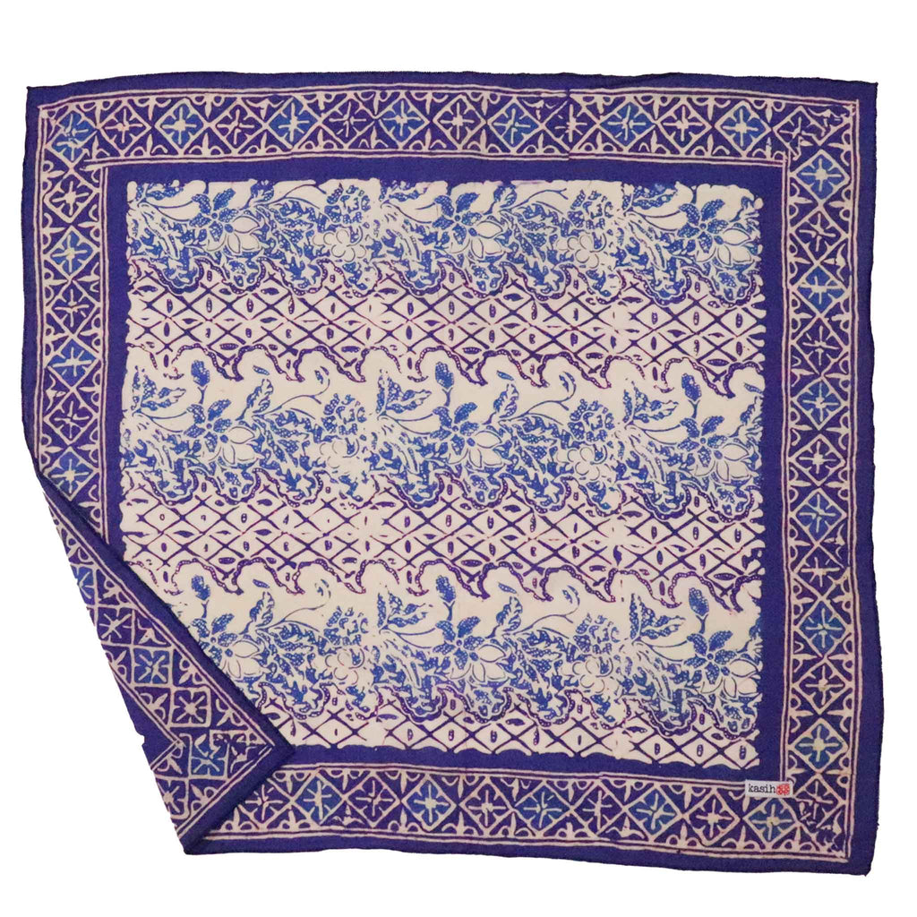 Decorative fabric with blue and white pattern on a white background