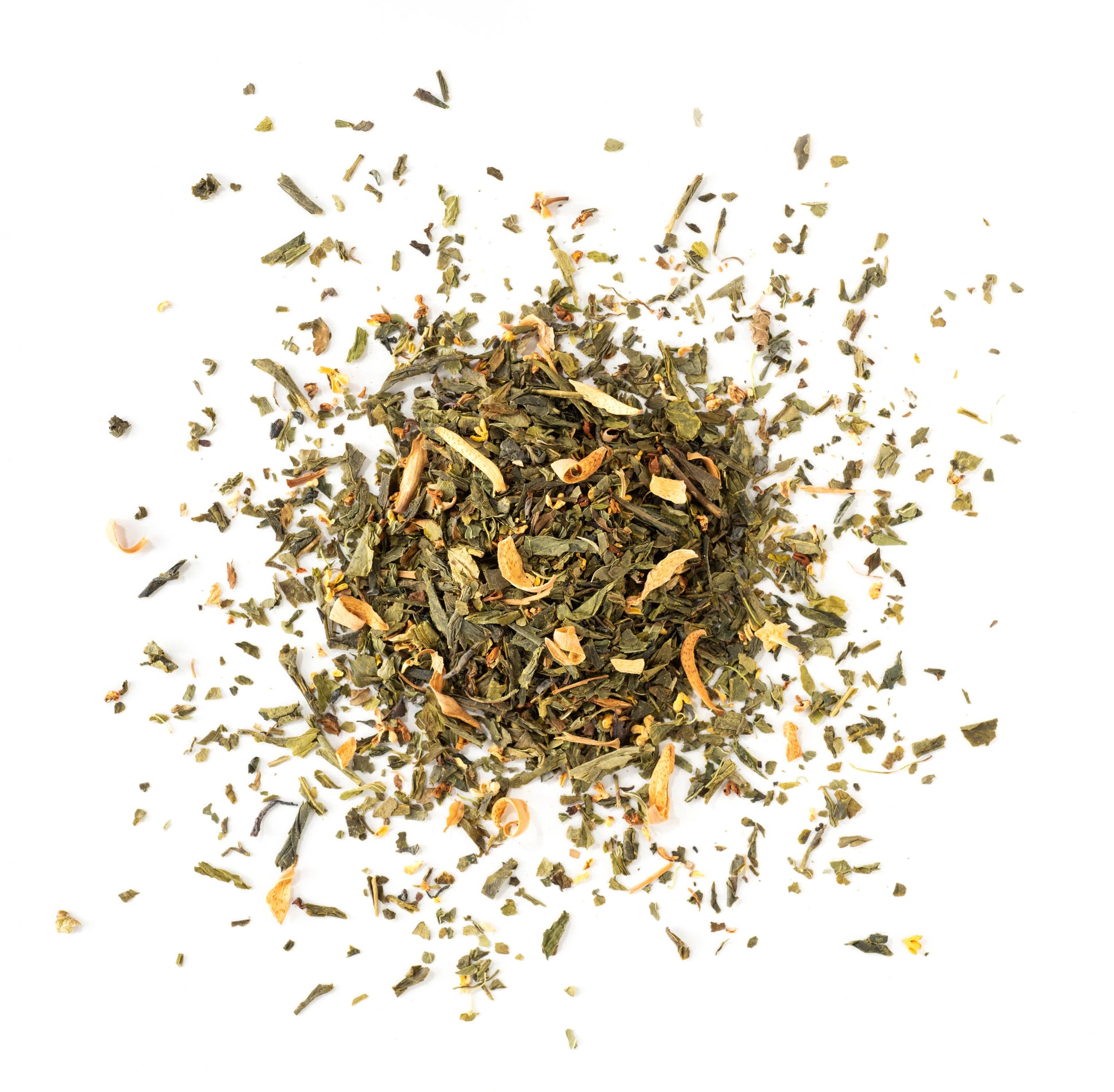 Dry green tea leaves on a white background