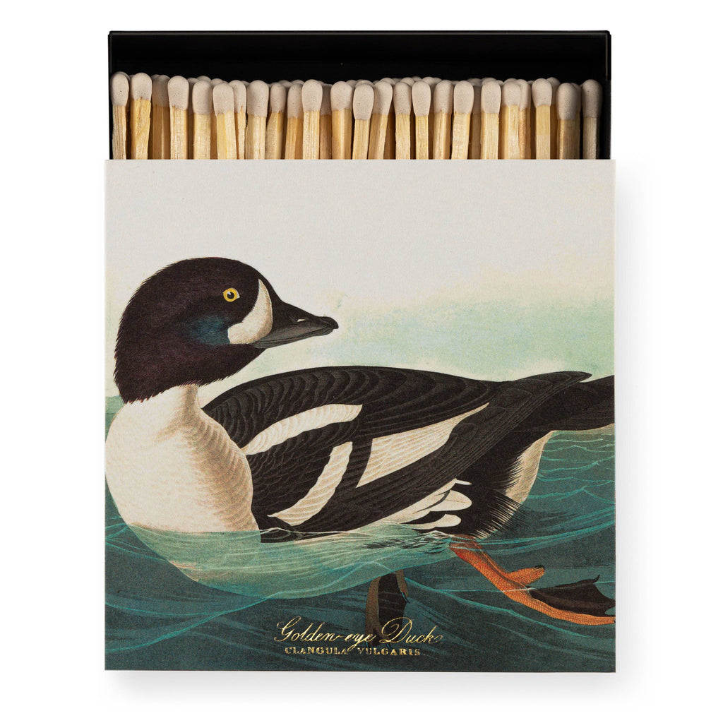 Matchbox with a Goldeneye Duck illustration on a white background