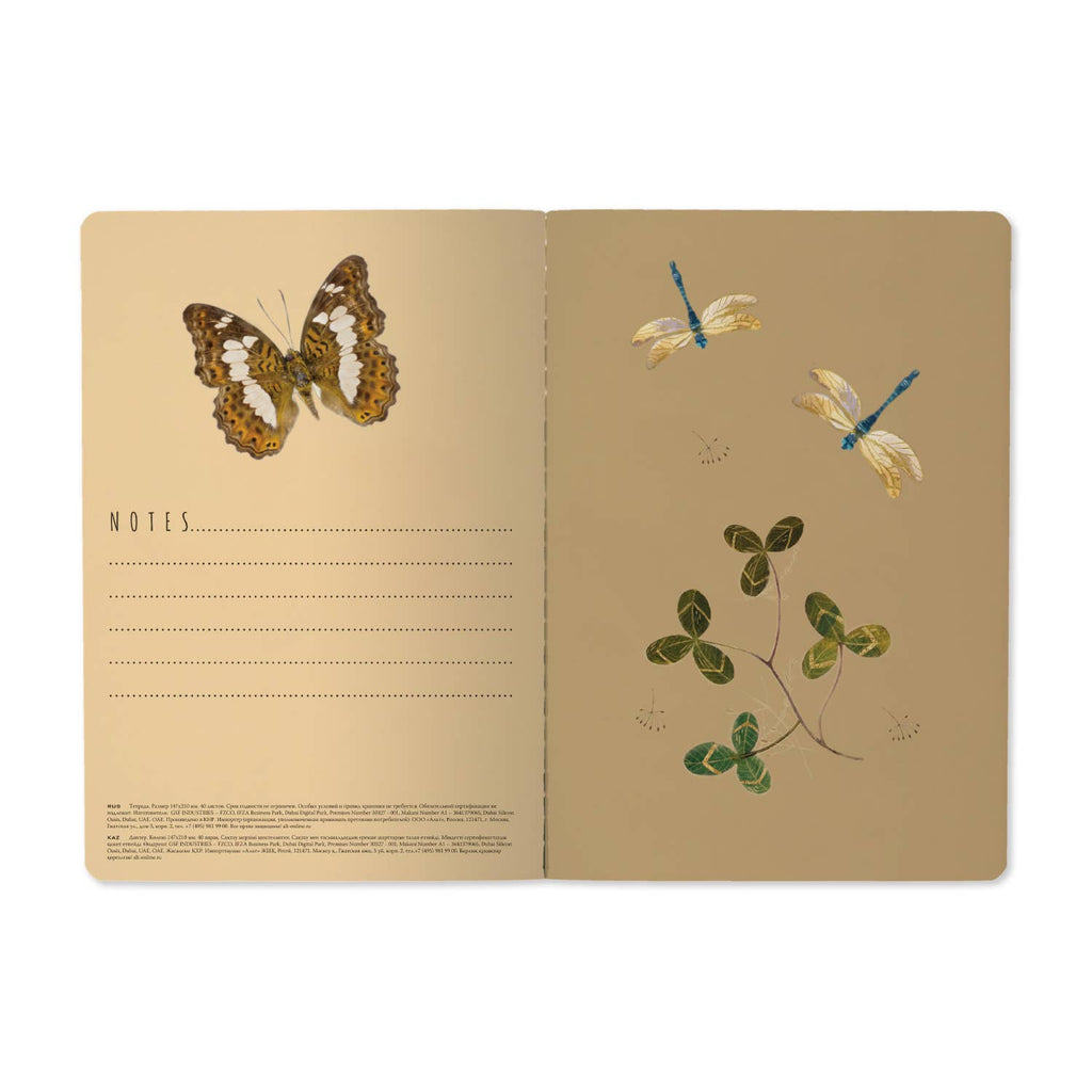 Open notebook with butterfly and dragonfly illustrations on a beige background