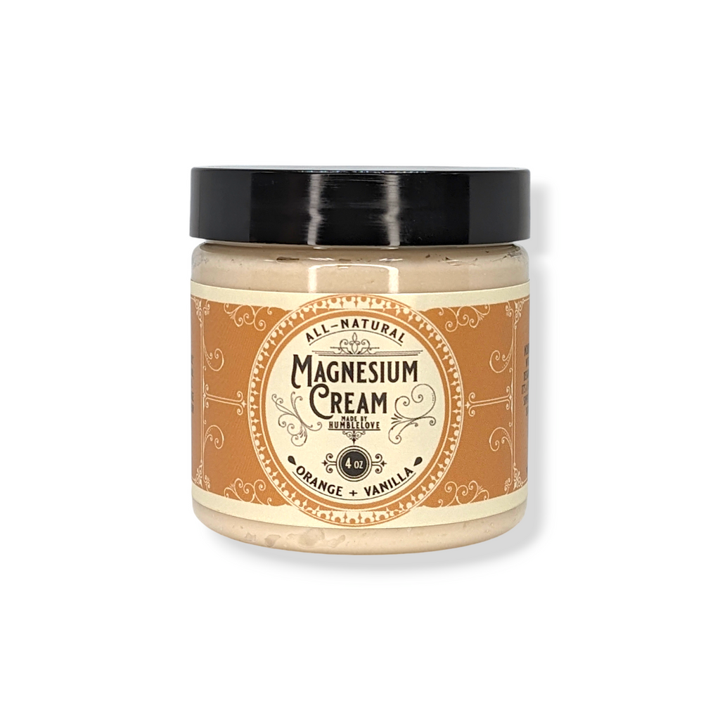 Jar of all-natural magnesium cream with a decorative label on a white background