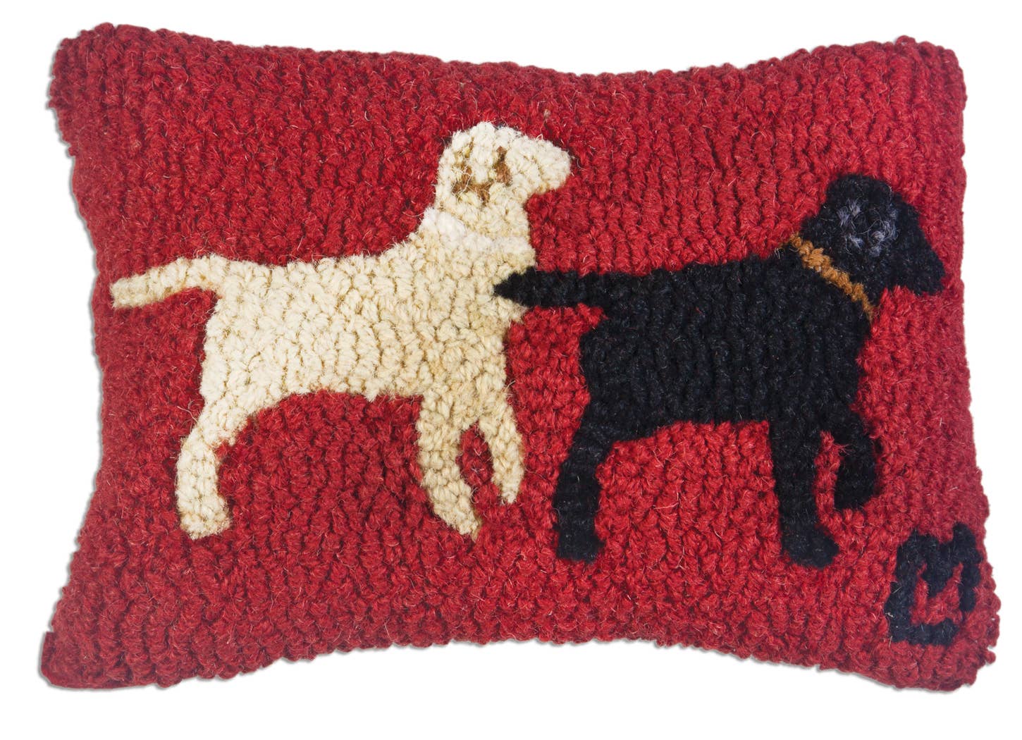 A square red textured throw pillow featuring a hand-hooked design of two dogs, one cream-colored and one black with a tan collar, on a white background.