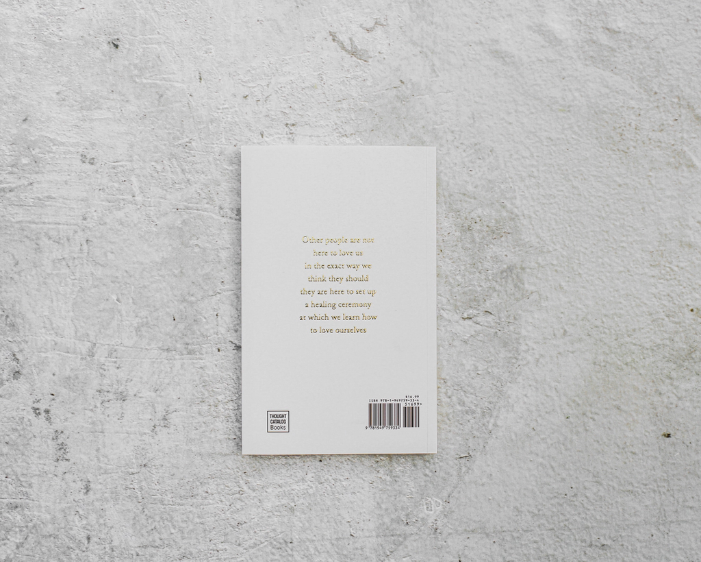 Book cover with text on a textured gray surface