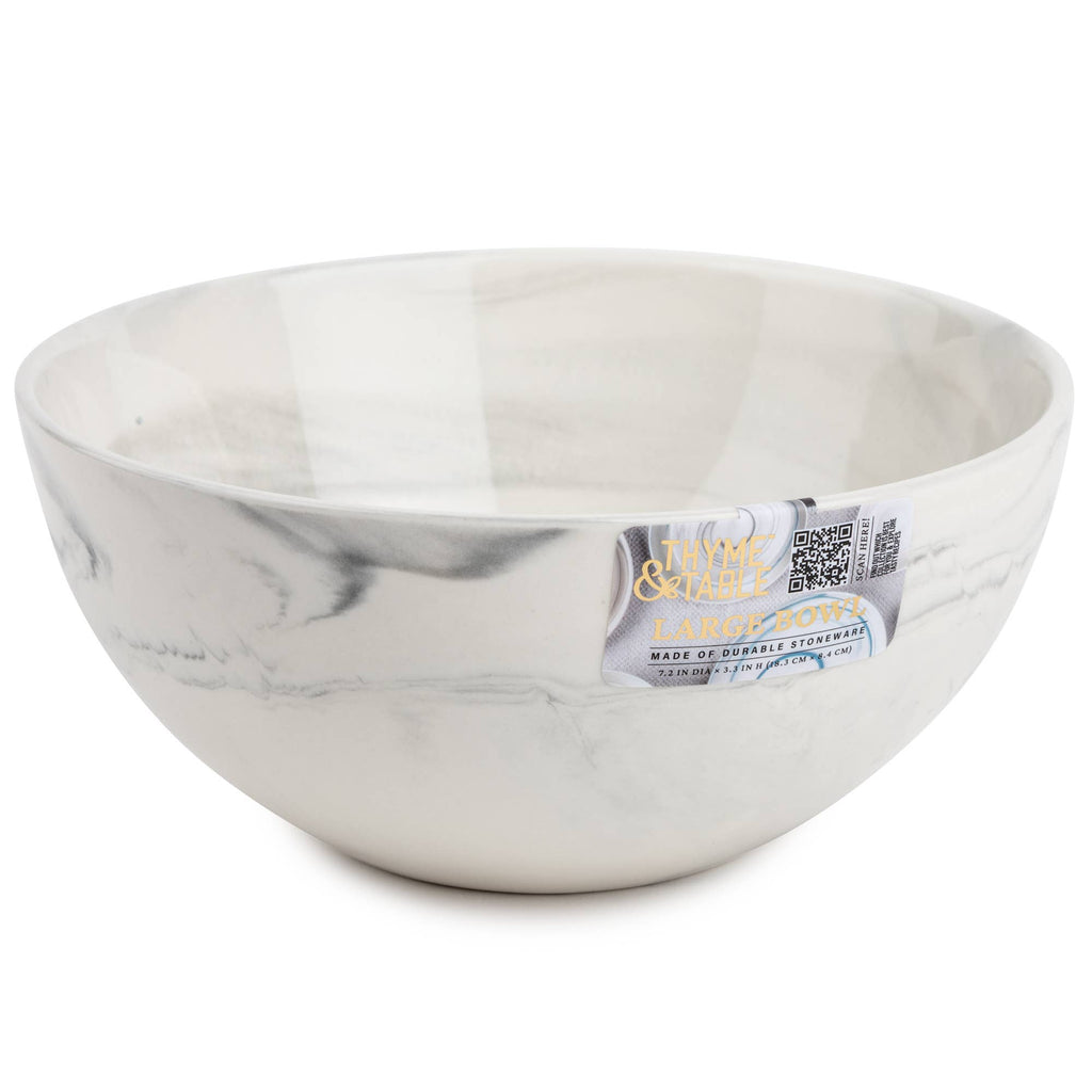 A white ceramic bowl with a gray marble pattern, featuring a paper label sticker on the side.