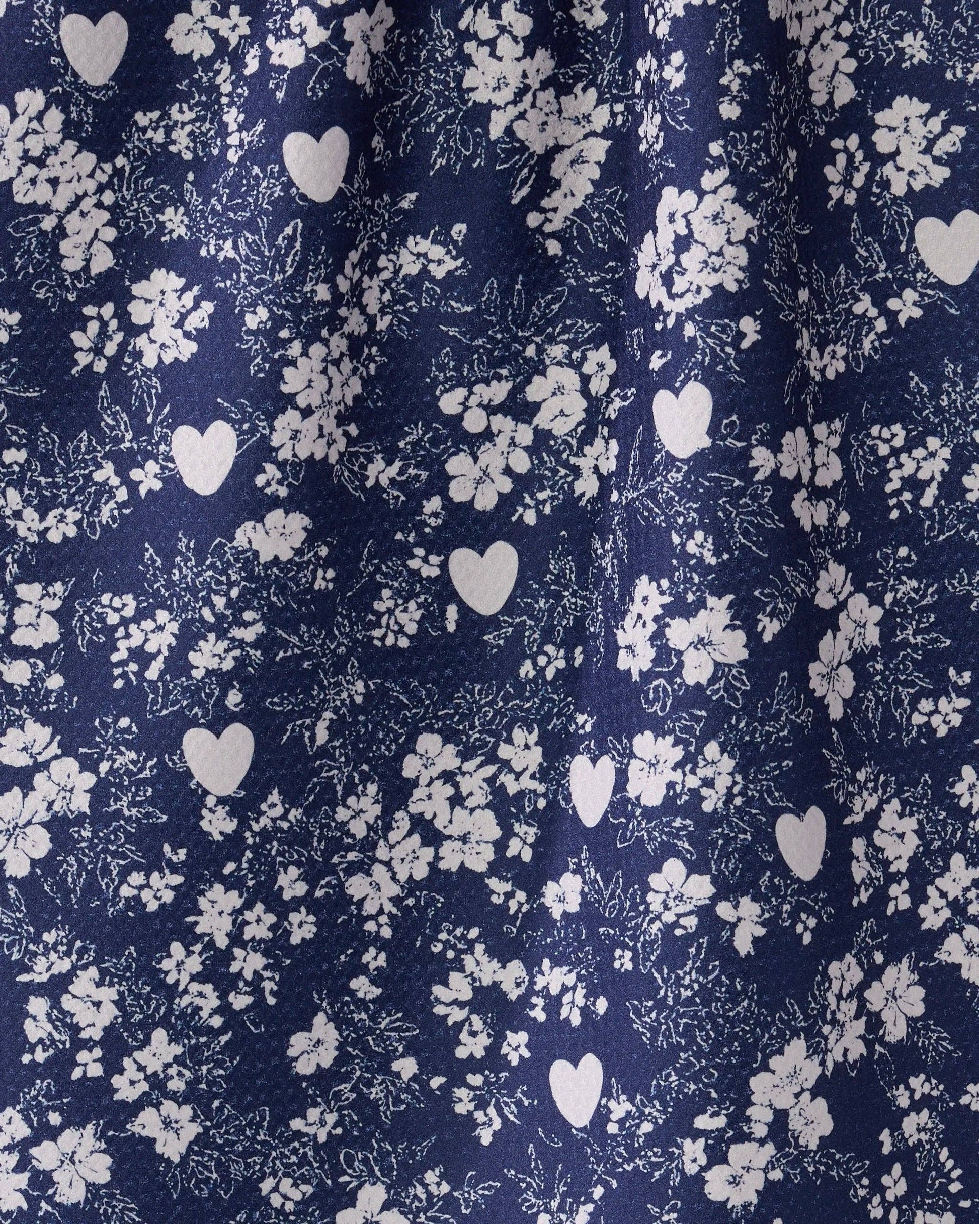 Navy fabric with white floral and heart pattern