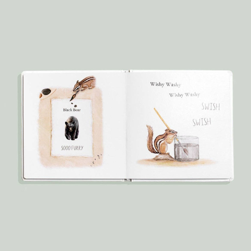 Open book with illustrations of a chipmunk and a bear on a light gray background