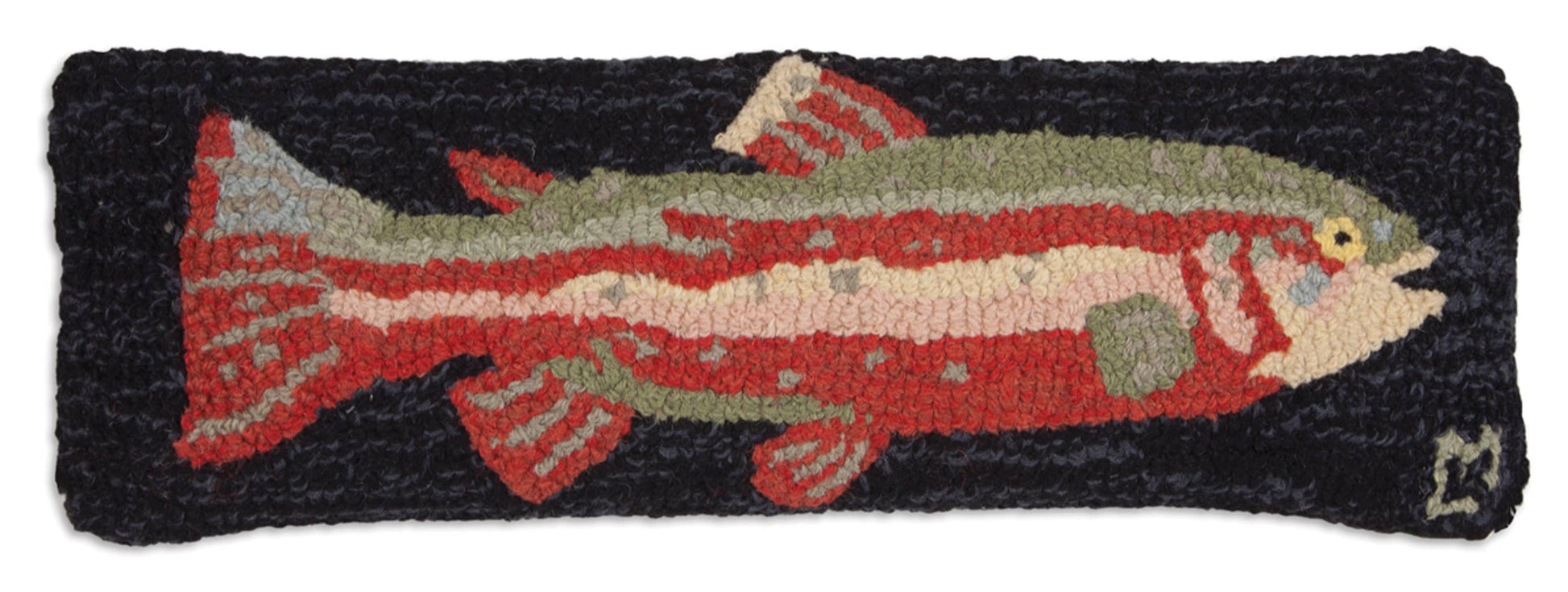 Decorative rug with a fish design on a black background