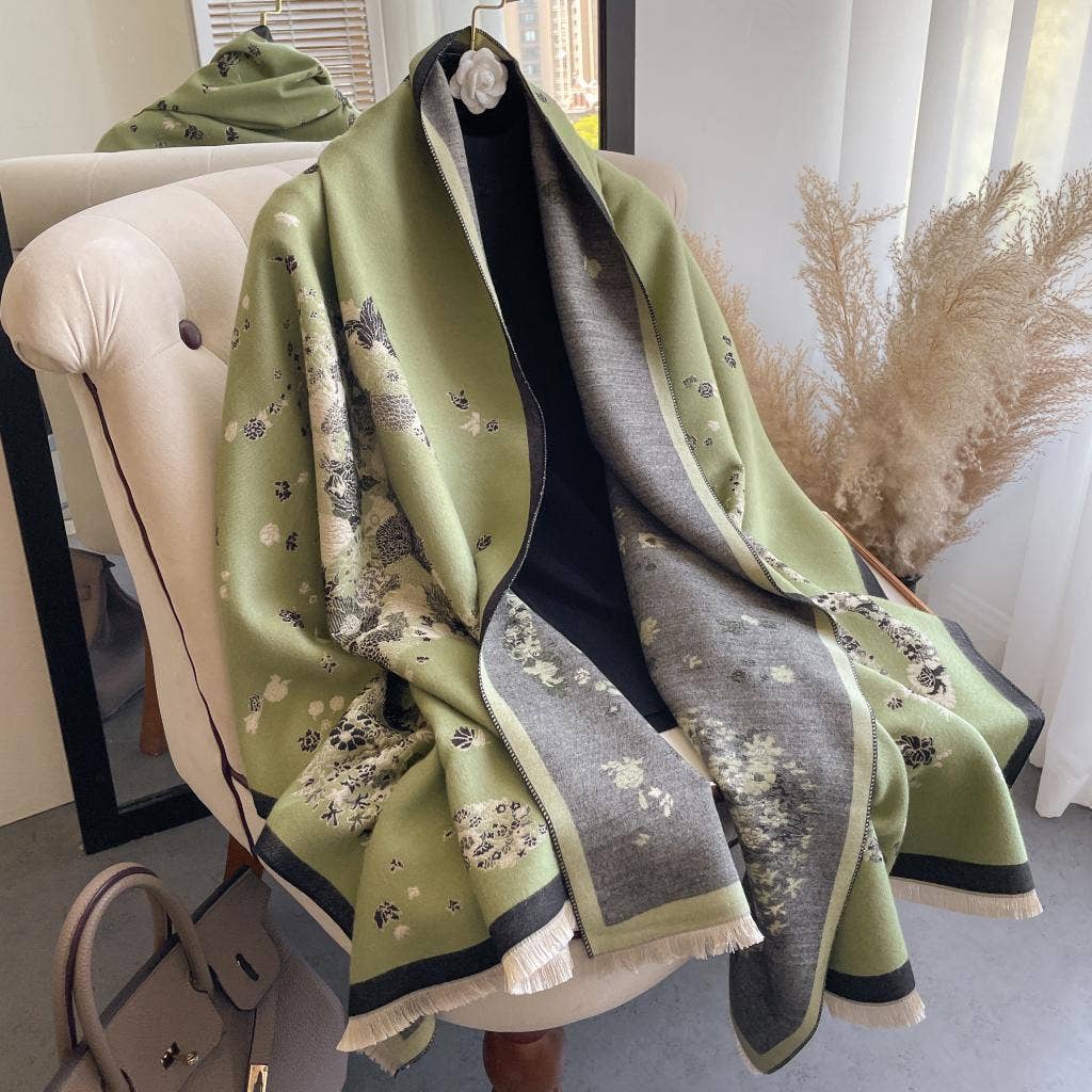 Green and gray patterned blanket draped over a chair in a room with decor elements.