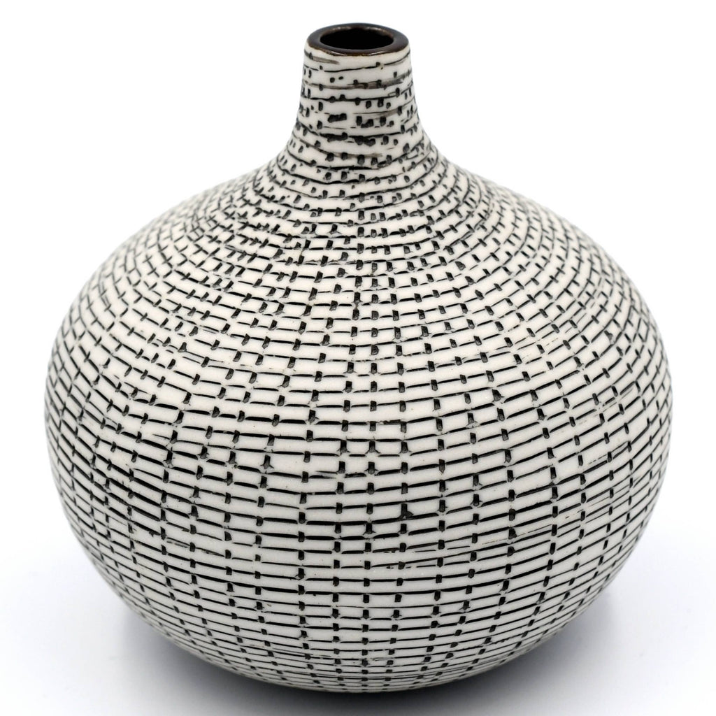 A ceramic vase with a rounded bulbous body and a short, narrow neck, decorated with a black hand-painted grid pattern on a glossy white glaze, set against a plain white background.