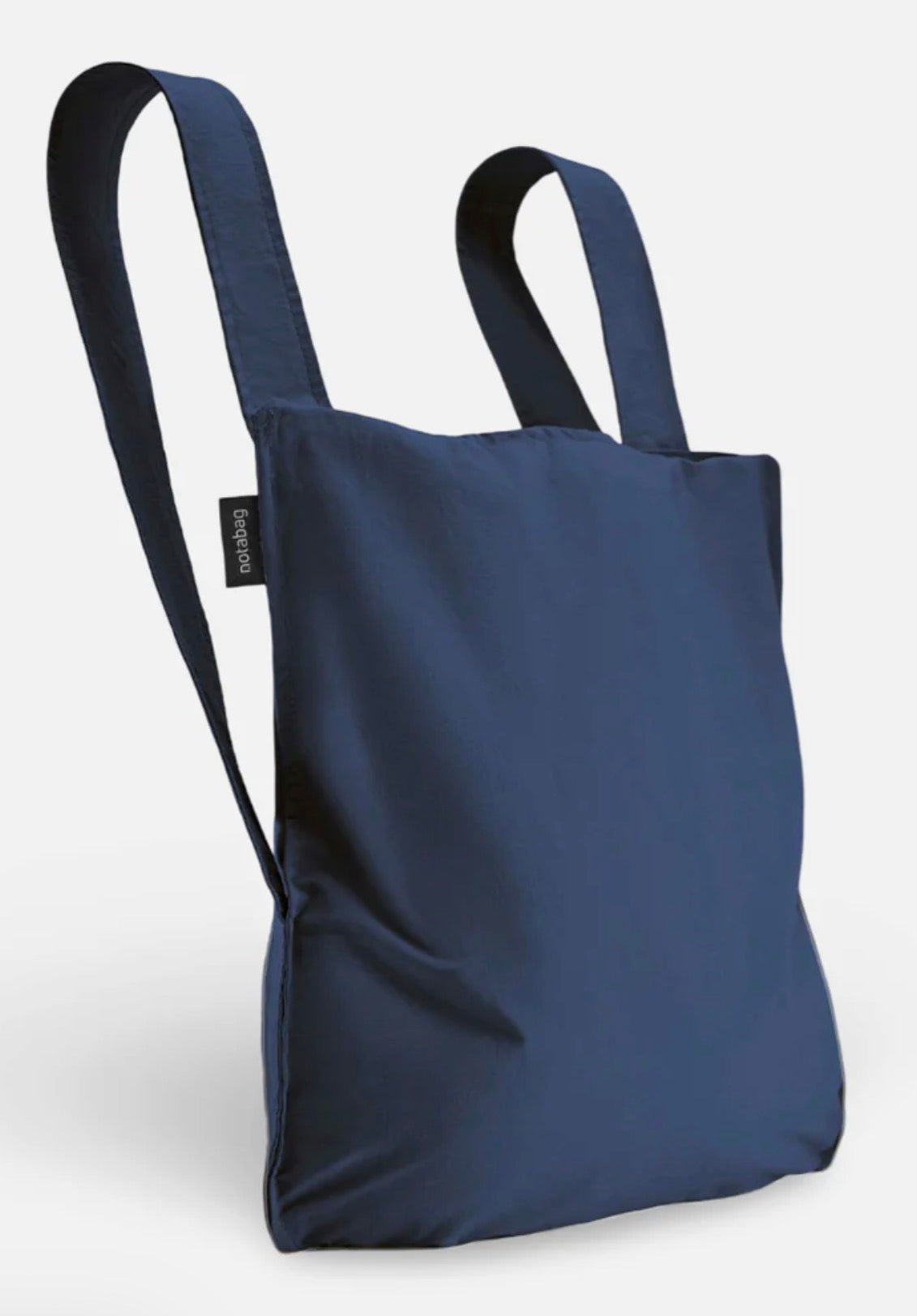 A navy blue reusable tote bag with dual shoulder straps, shown on a clean white background. A small black fabric tag on the side displays the brand name 'sodabi'.