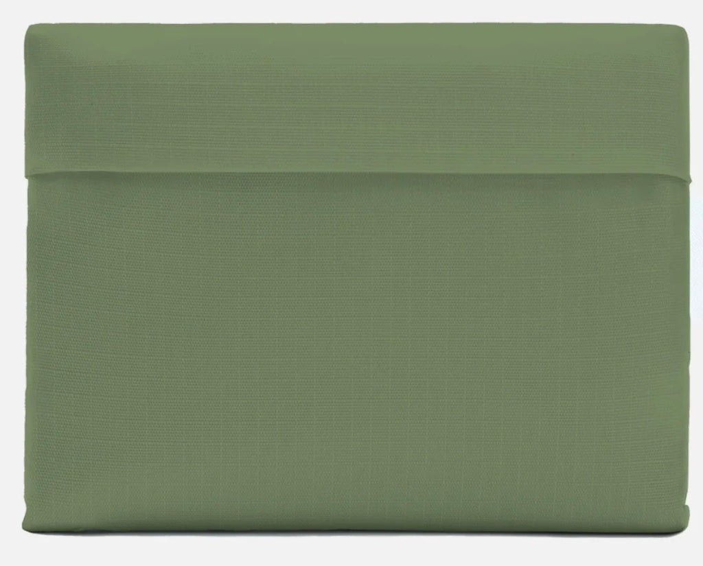 A sage green fabric pouch or sleeve with a horizontal stitched seam across the top, shown against a plain white background.