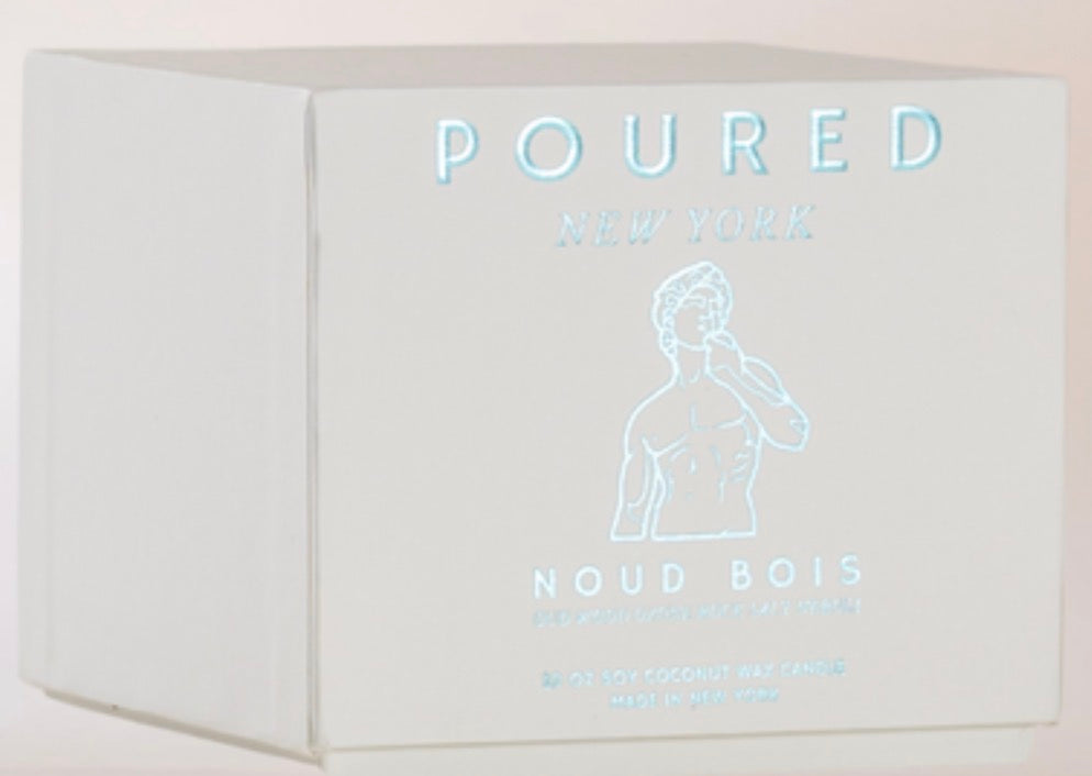 A white rectangular box for Poured New York Noud Bois fragrance, featuring light blue embossed text and a minimalist male figure illustration on the front.