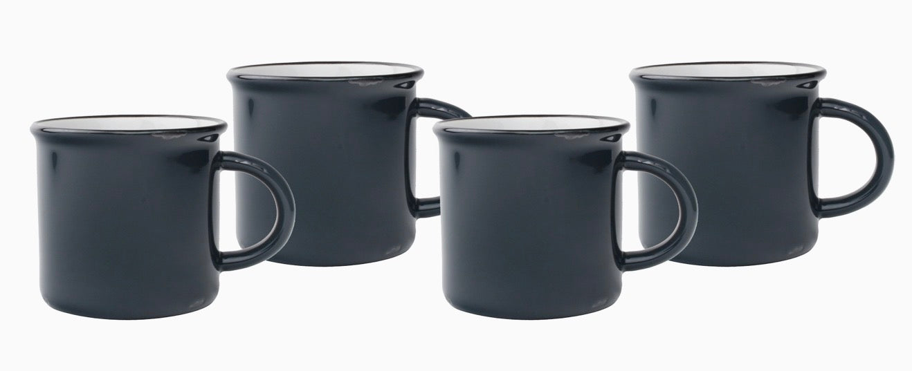Four dark  slate ceramic mugs with white interiors, arranged on a plain white background.