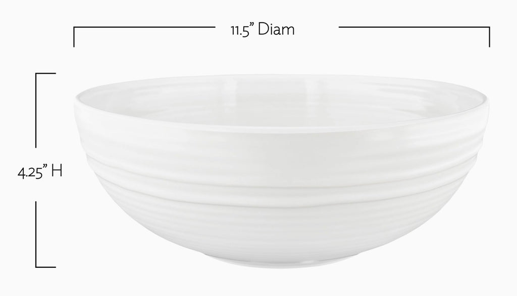 A white ceramic bowl with a ribbed exterior, shown with dimension lines indicating a diameter of 11.5 inches and a height of 4.