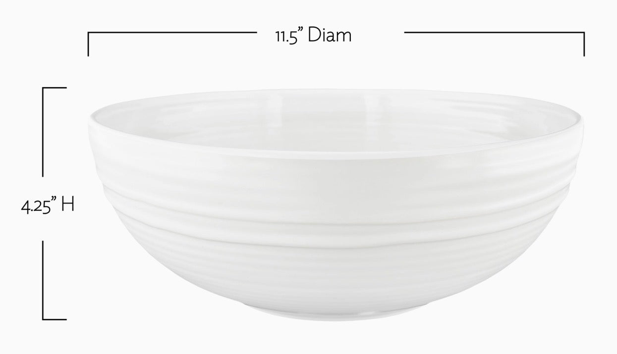 A white ceramic bowl with a ribbed exterior, shown with dimension lines indicating a diameter of 11.5 inches and a height of 4.