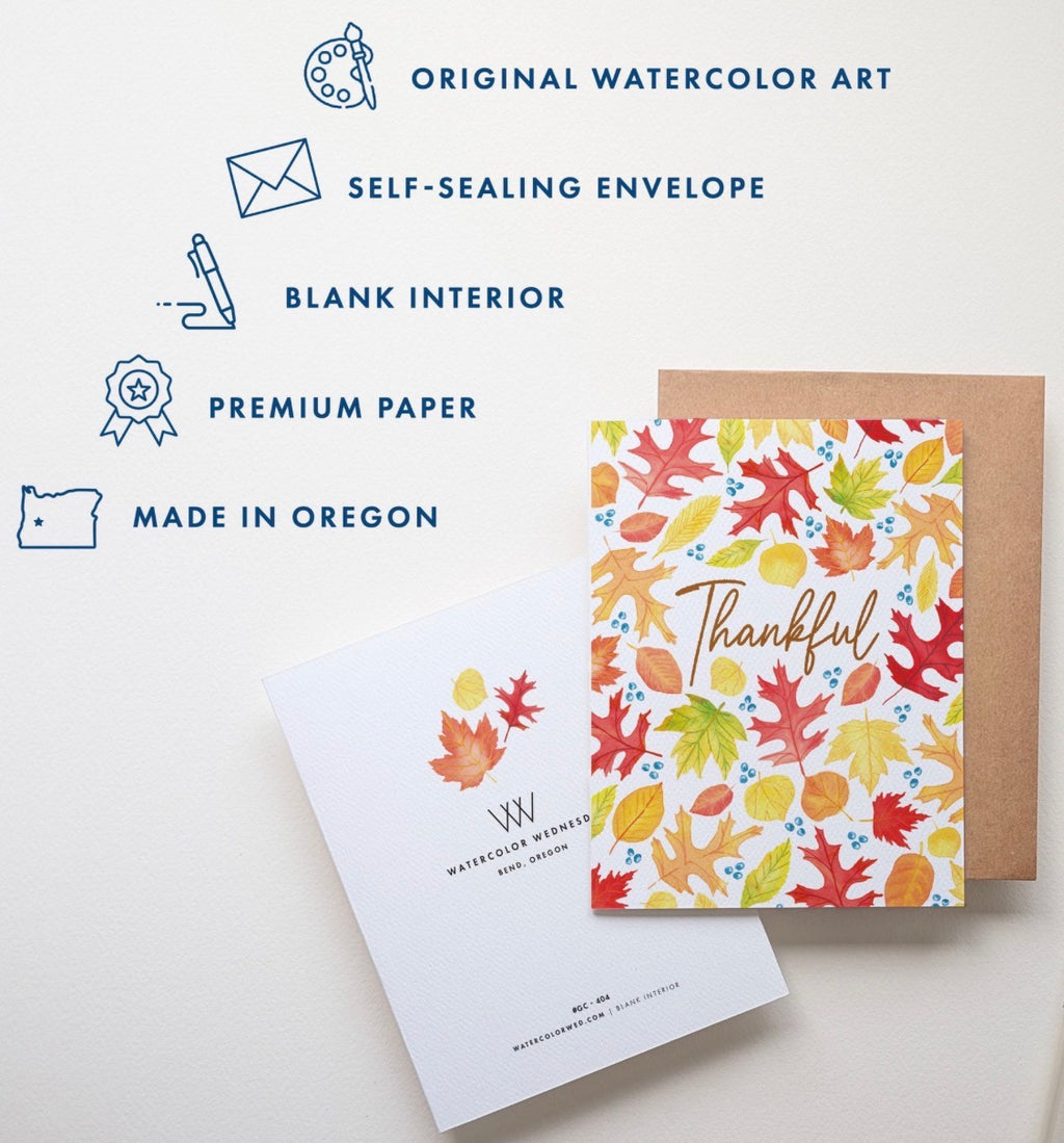 A greeting card set displayed on a light background with feature callouts. The set includes a white card with colorful autumn watercolor leaves and the word 'Thankful' in gold script, a kraft envelope, and a white envelope with a watercolor leaf design.