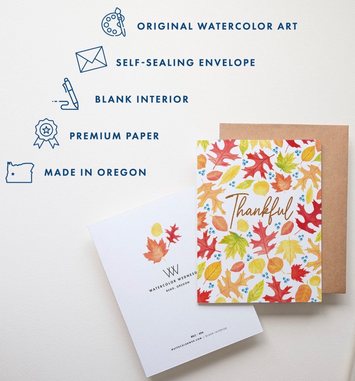 A greeting card set displayed on a light background with feature callouts. The set includes a white card with colorful autumn watercolor leaves and the word 'Thankful' in gold script, a kraft envelope, and a white envelope with a watercolor leaf design.