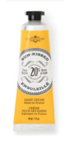 A squeeze tube of 'Not Just Messed' 20% Enmolliente Hand Cream, featuring a bright yellow body with a black cap and a white and black label.