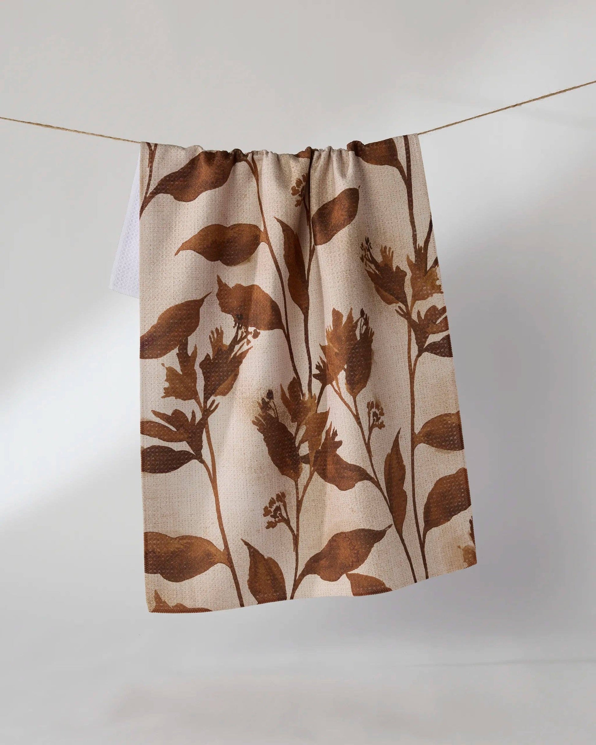 Skirt with brown floral pattern on a white background
