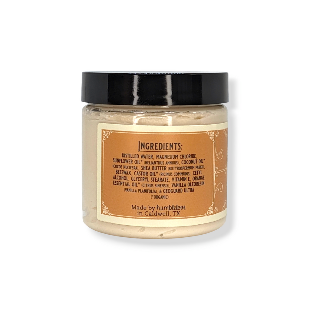 Jar of cream with a label on a white background