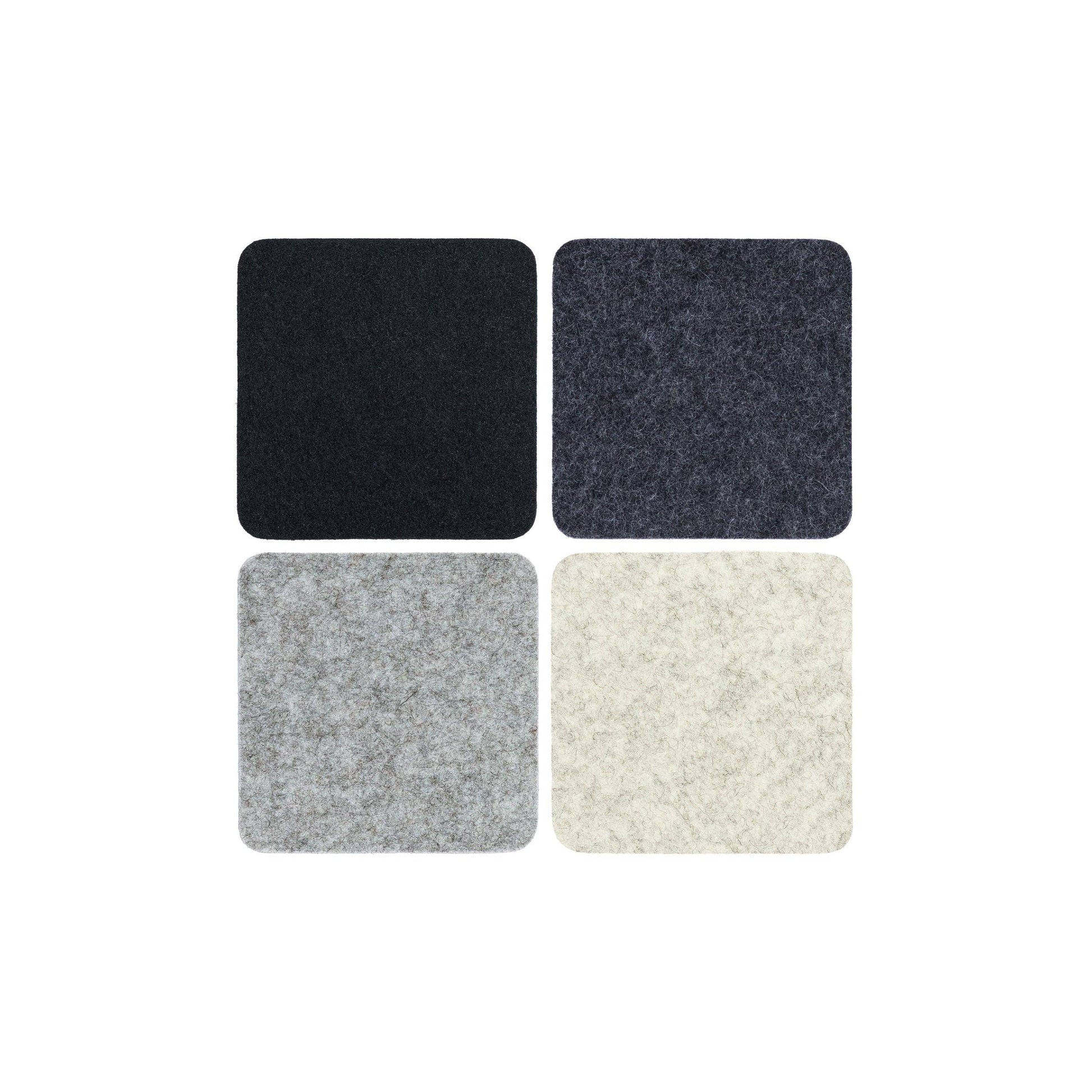 Four square samples of different textured fabrics on a white background