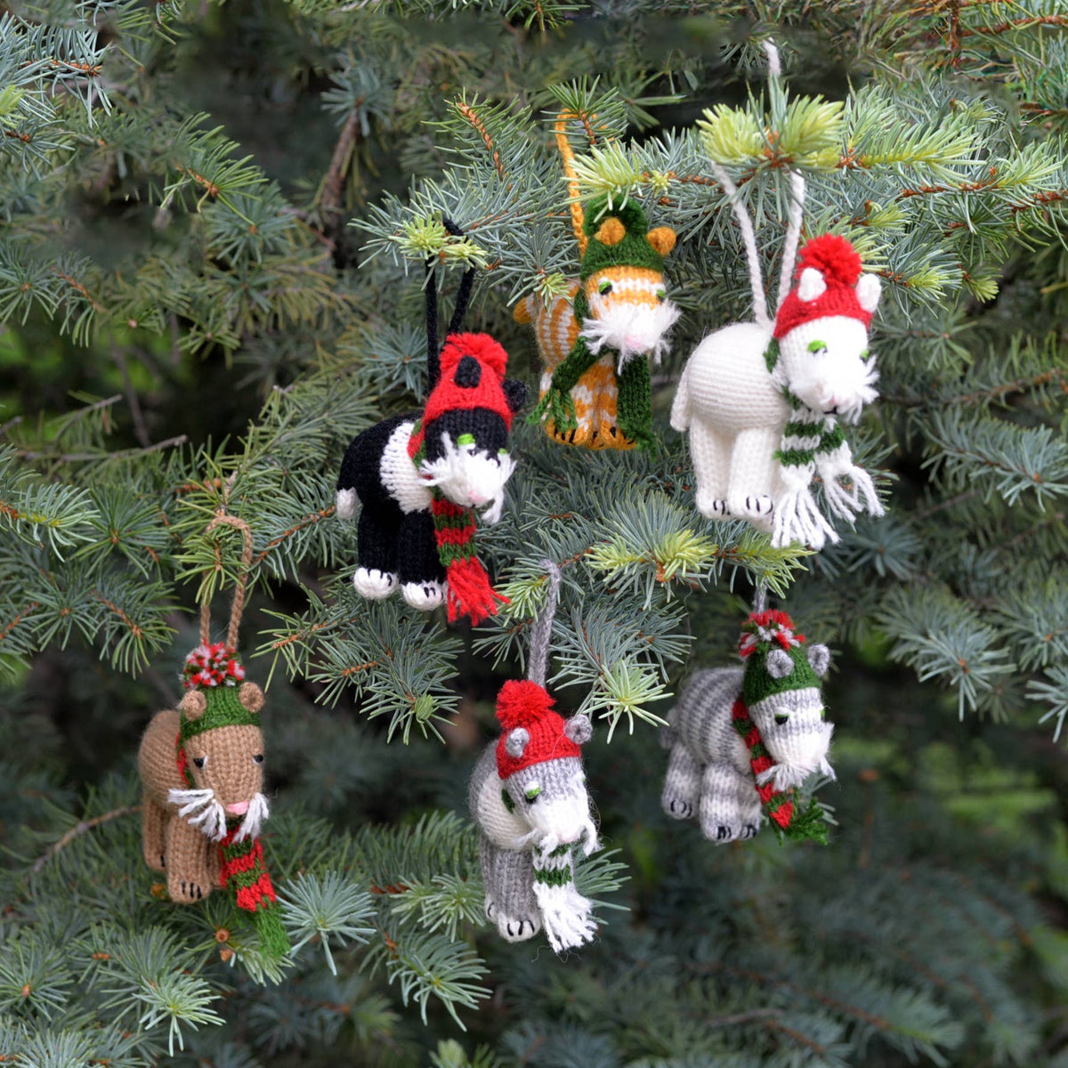 Knitted animal ornaments on a Christmas tree