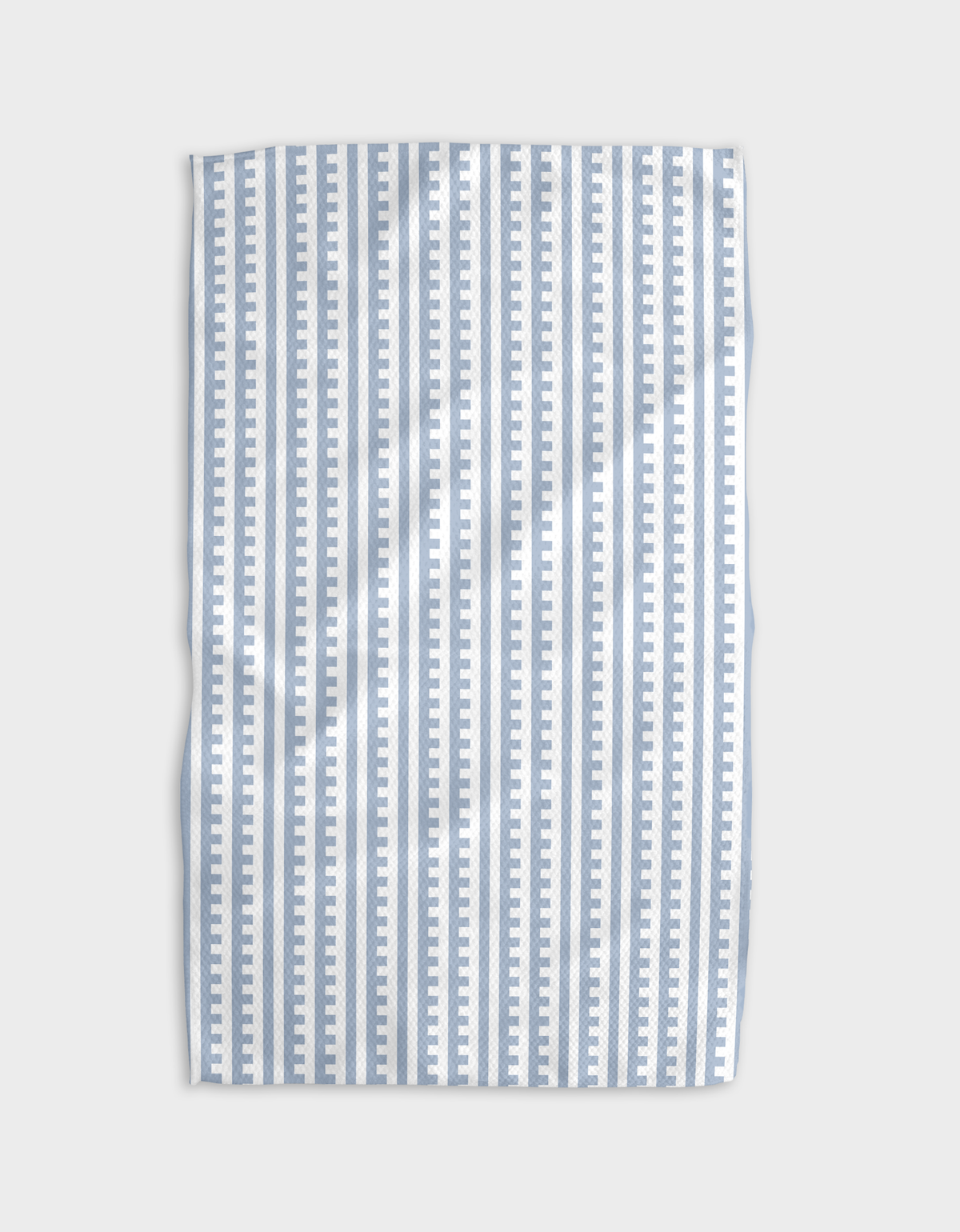 A rectangular fabric item, likely a tea towel or hand towel, featuring a vertical stripe pattern of light blue and white stripes with small white geometric accents in the center of each stripe, shown flat against a light gray background.