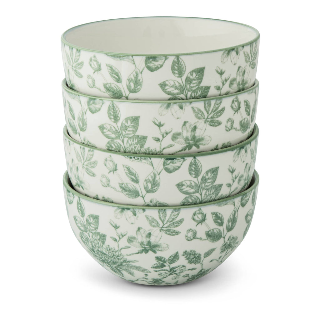 Set of four ceramic bowls with green leaf pattern on a white background