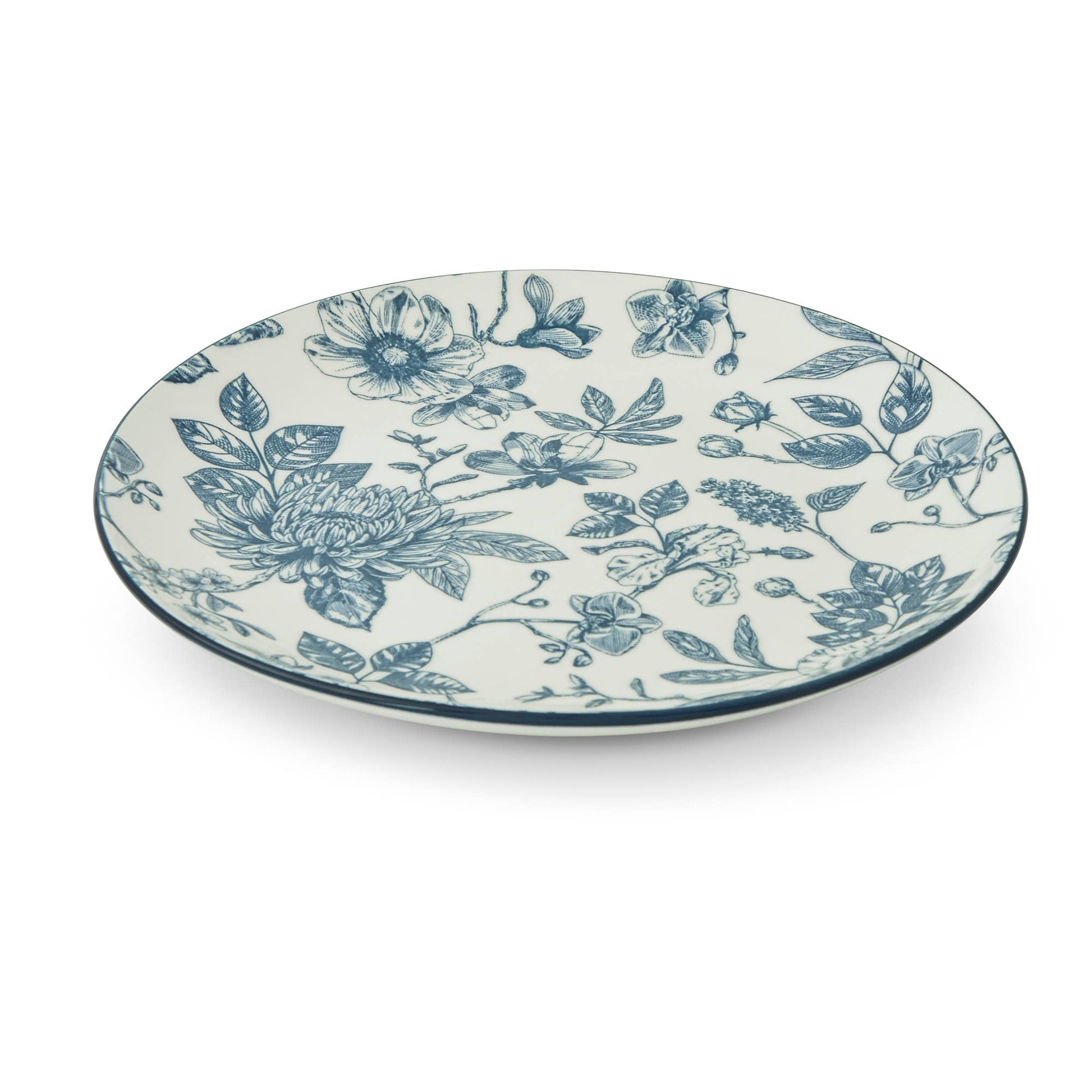 An oval ceramic plate with a blue floral toile pattern on a white background, photographed from a high angle on a clean white studio background.