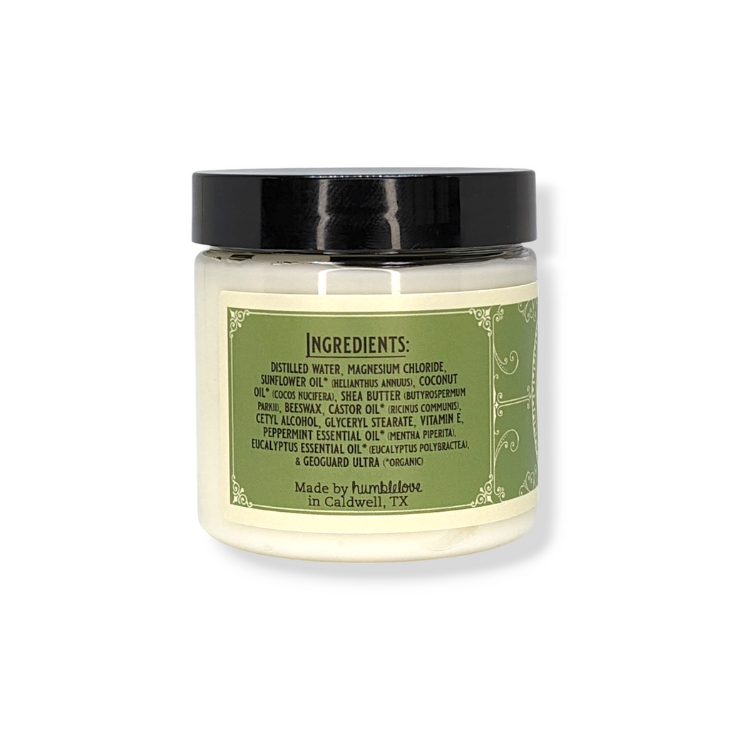 Jar with a black lid and green label on a white background