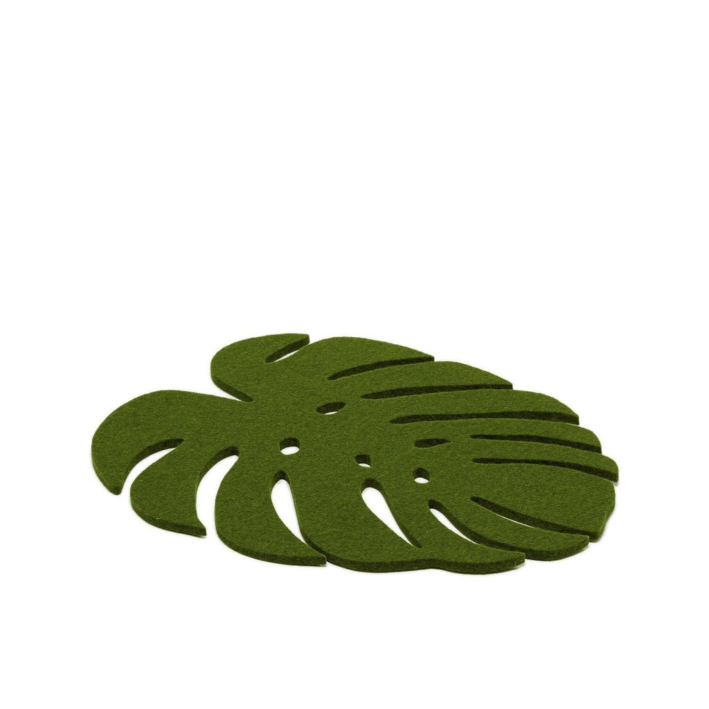 Green leaf-shaped coasters on a white background
