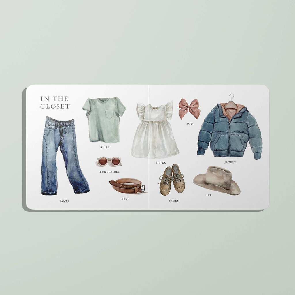 Illustrated children's book open to a page titled 'In the Closet' with clothing items on a light green background.